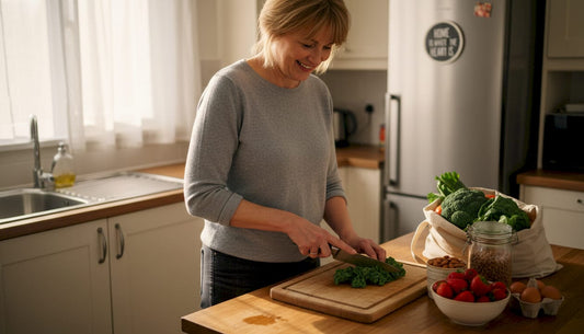 Woman chopping nutrient-rich foods in kitchen