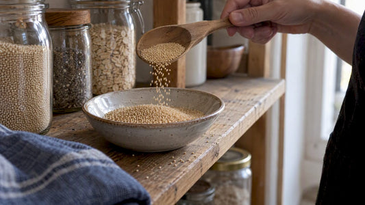Tiny pale-gold amaranth seeds in a dish