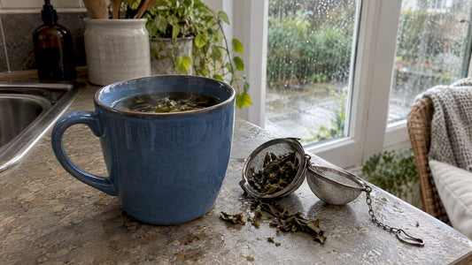 Red raspberry leaf tea steeping in blue mug